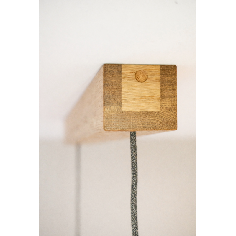 Oak block with fabric cord.png